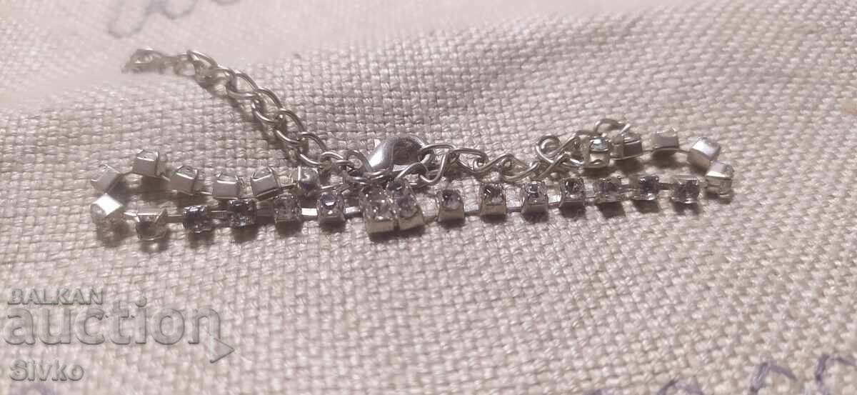 Silver ring with zircons