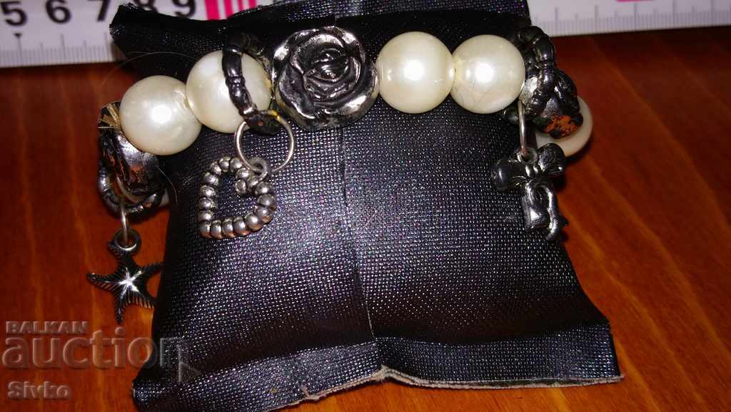 Pendant with pearls, sea star, sun, heart with price 0.01 BGN | € 0.01 Pendant with pearls, sea star, sun, heart with price 0.01 BGN | € 0.01