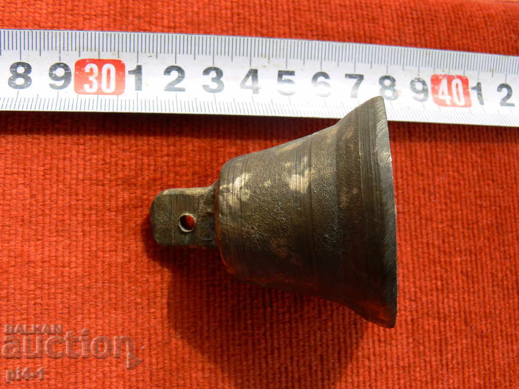 Old bronze charm, bell