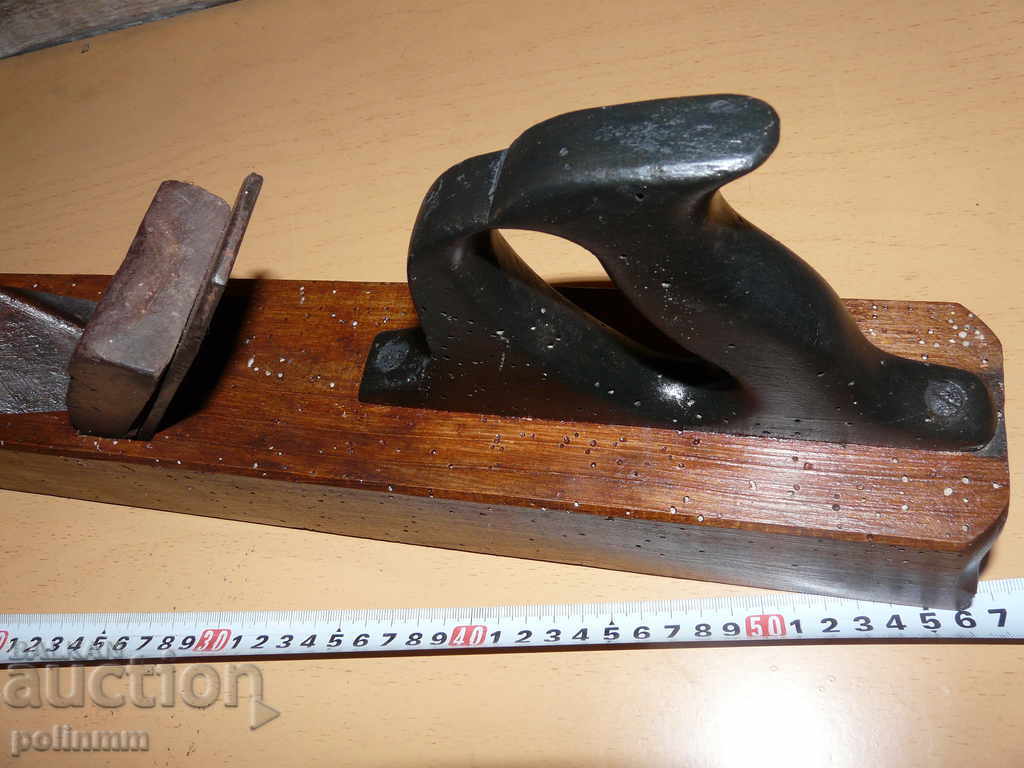 Auction A large old grater Auction A large old grater