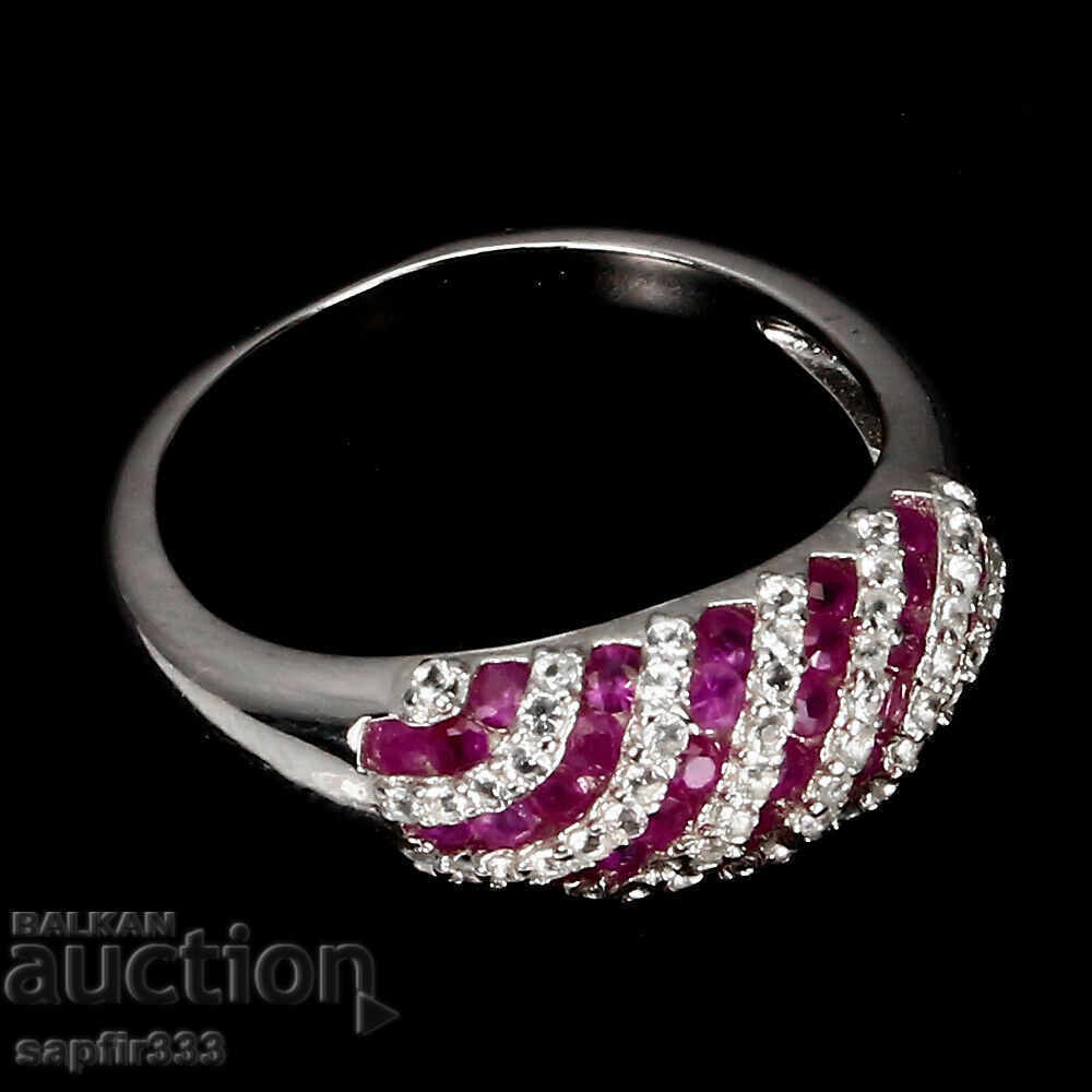 Auction  DESIGNER RING WITH NATURAL RUBY AND TOPAS