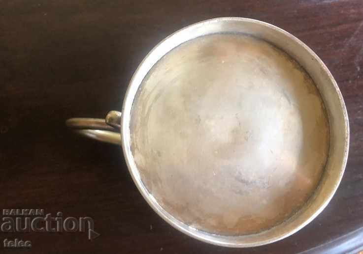 Auction  An antique silver-plated goblet