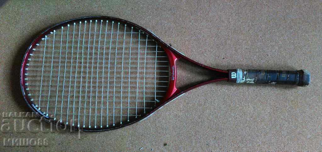 Old WILSON tennis racket.