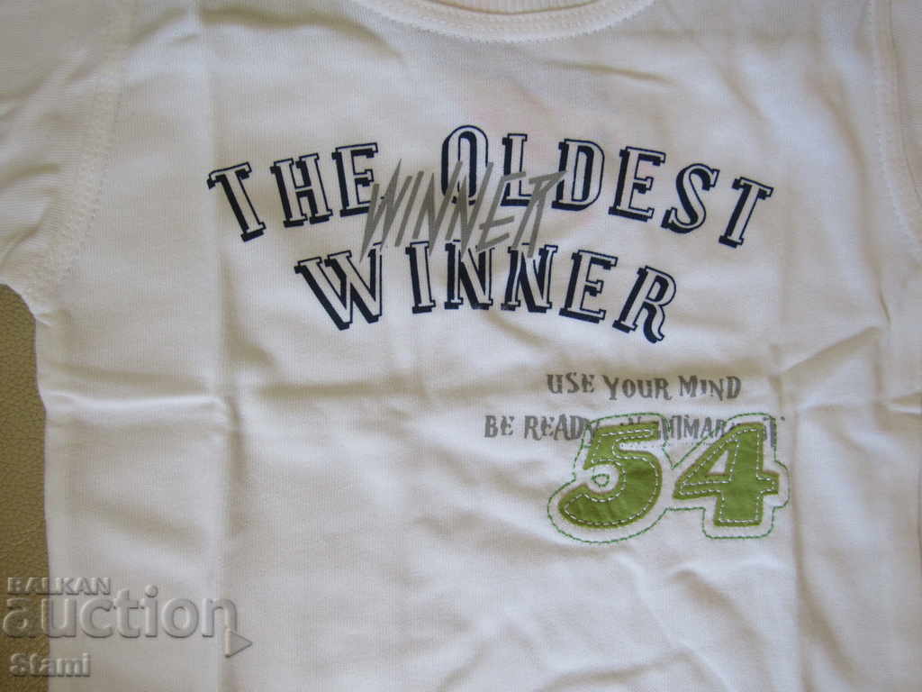 Детска тениска за момче бяло със зелена платка, размер 30 с цена 7.50 лв. | € 3.83 Детска тениска за момче бяло със зелена платка, размер 30 с цена 7.50 лв. | € 3.83