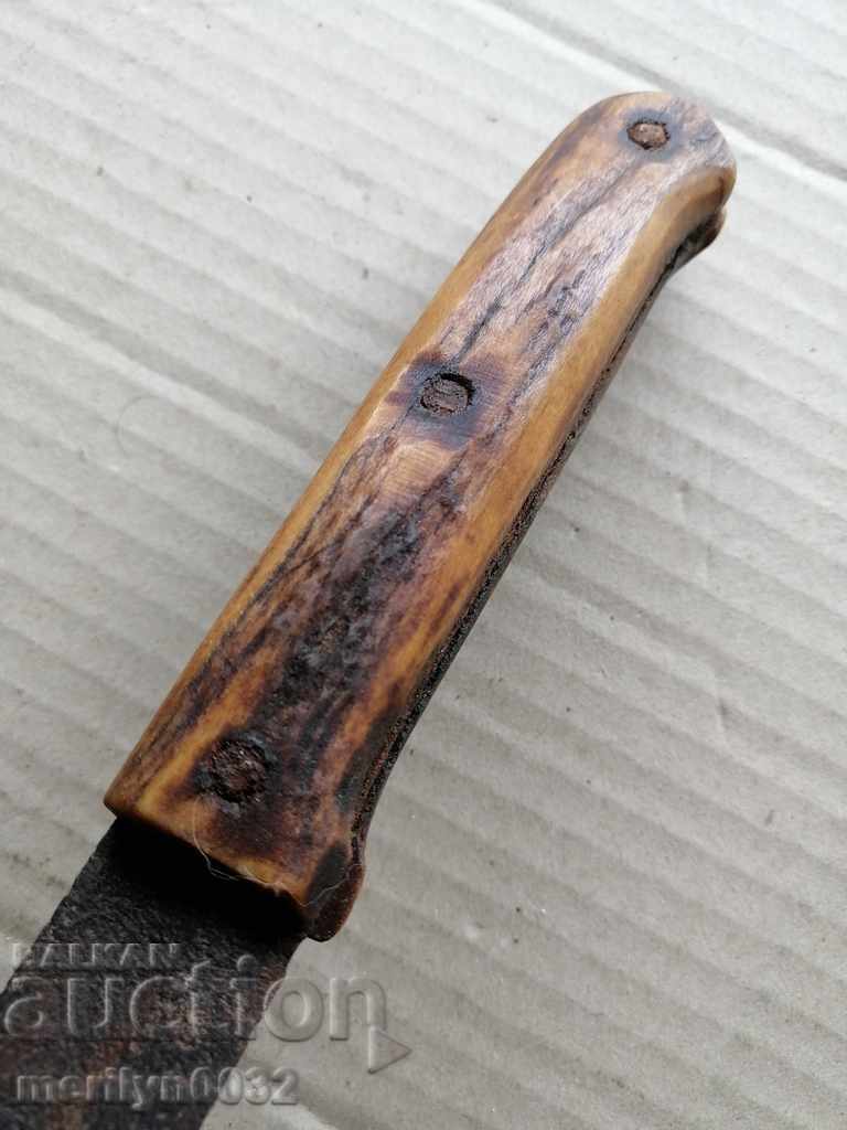 Delivery of An old trench knife with primrose antlers Delivery of An old trench knife with primrose antlers