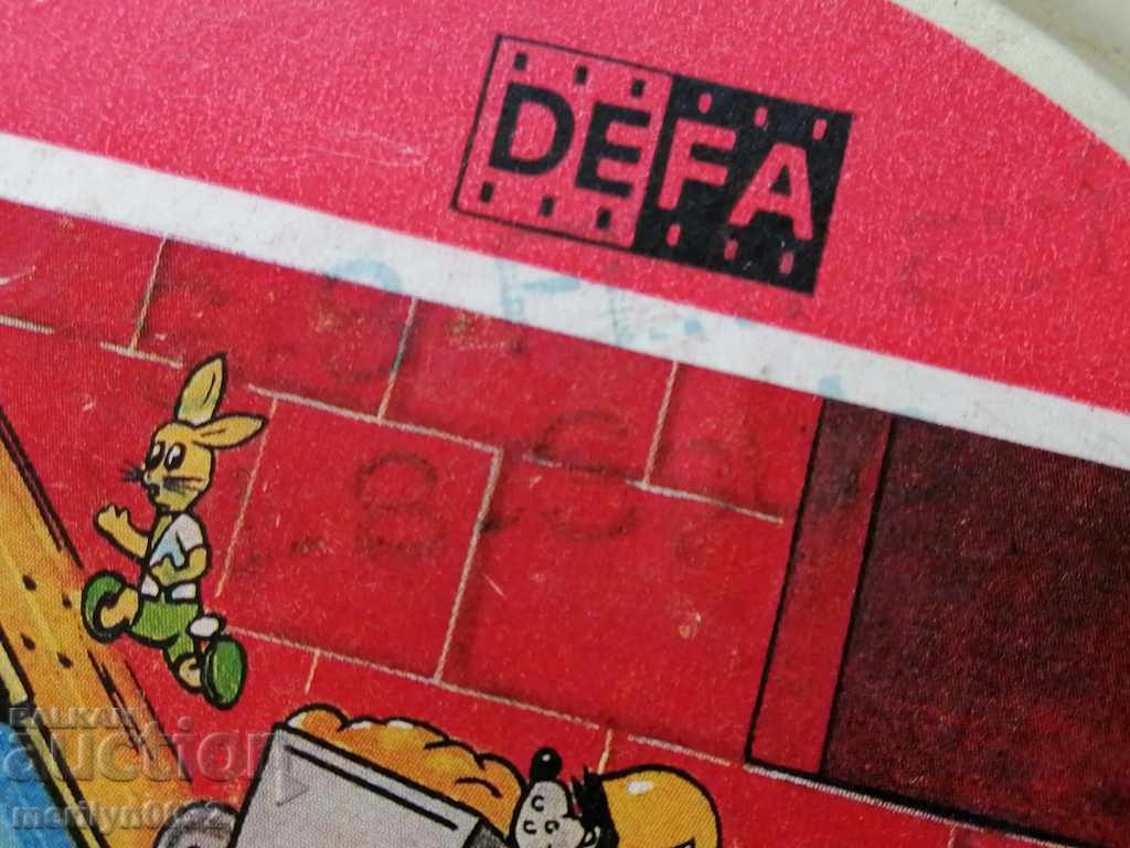 Banda de film GDR într-o cutie cu filmul cinematografiei Nu Pogodi - 7 Banda de film GDR într-o cutie cu filmul cinematografiei Nu Pogodi - 7