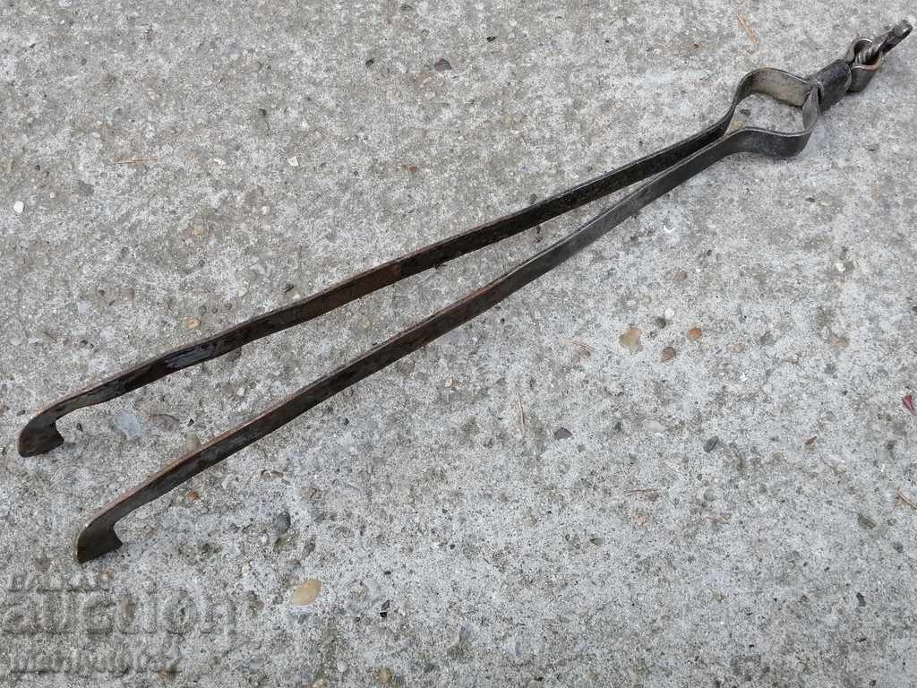 Delivery of Old hand forged dilaf, wrought iron, mask Delivery of Old hand forged dilaf, wrought iron, mask