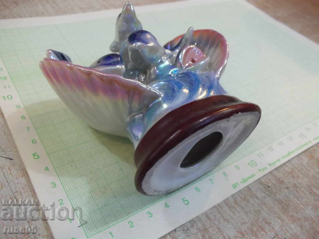 Figure of three porcelain dolphins with price 15.00 BGN | € 7.67 Figure of three porcelain dolphins with price 15.00 BGN | € 7.67