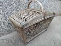 An old basket, a wicker vessel, a wooden paneer basket