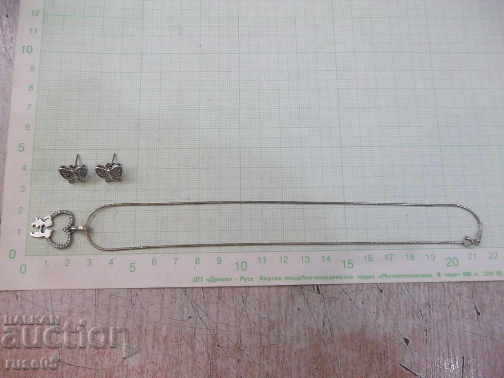 Auction Set of earrings and cigar with pendant silver 925-8.05 g. Auction Set of earrings and cigar with pendant silver 925-8.05 g.