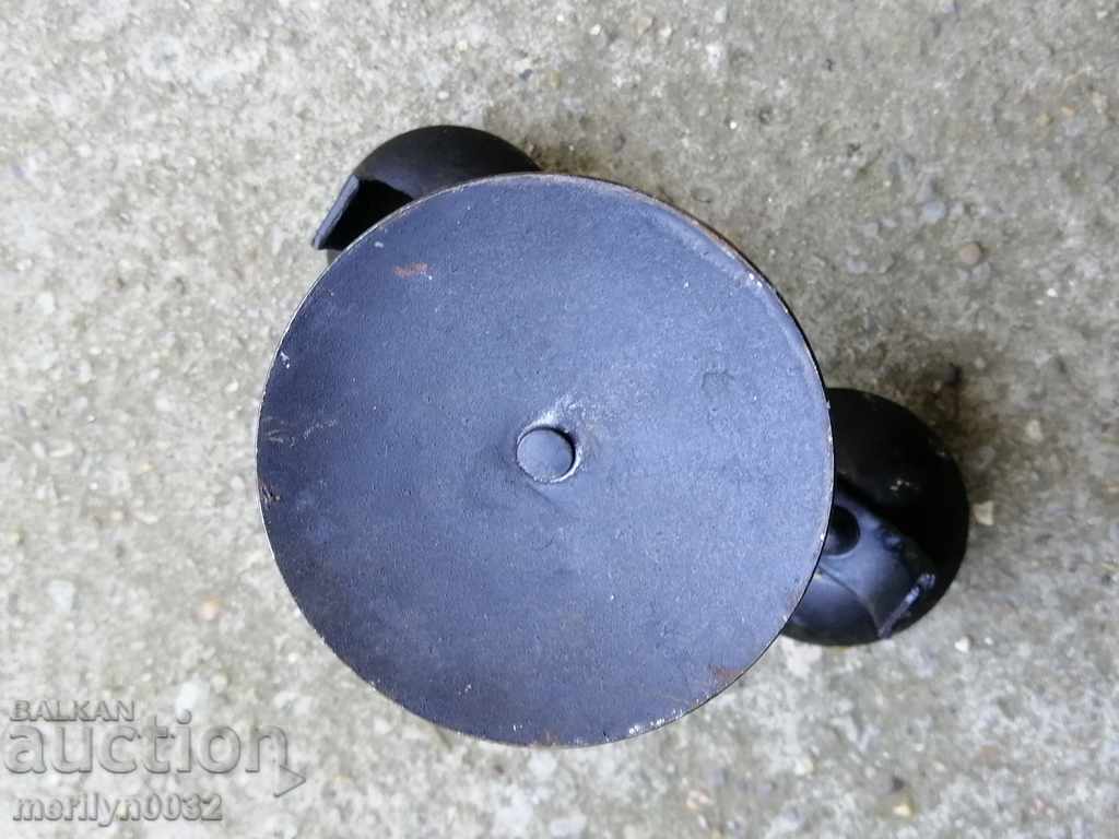 Delivery of An old candle made of wrought iron lamp