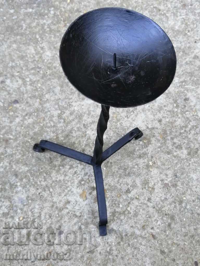 Auction  An old candle made of wrought iron lamp