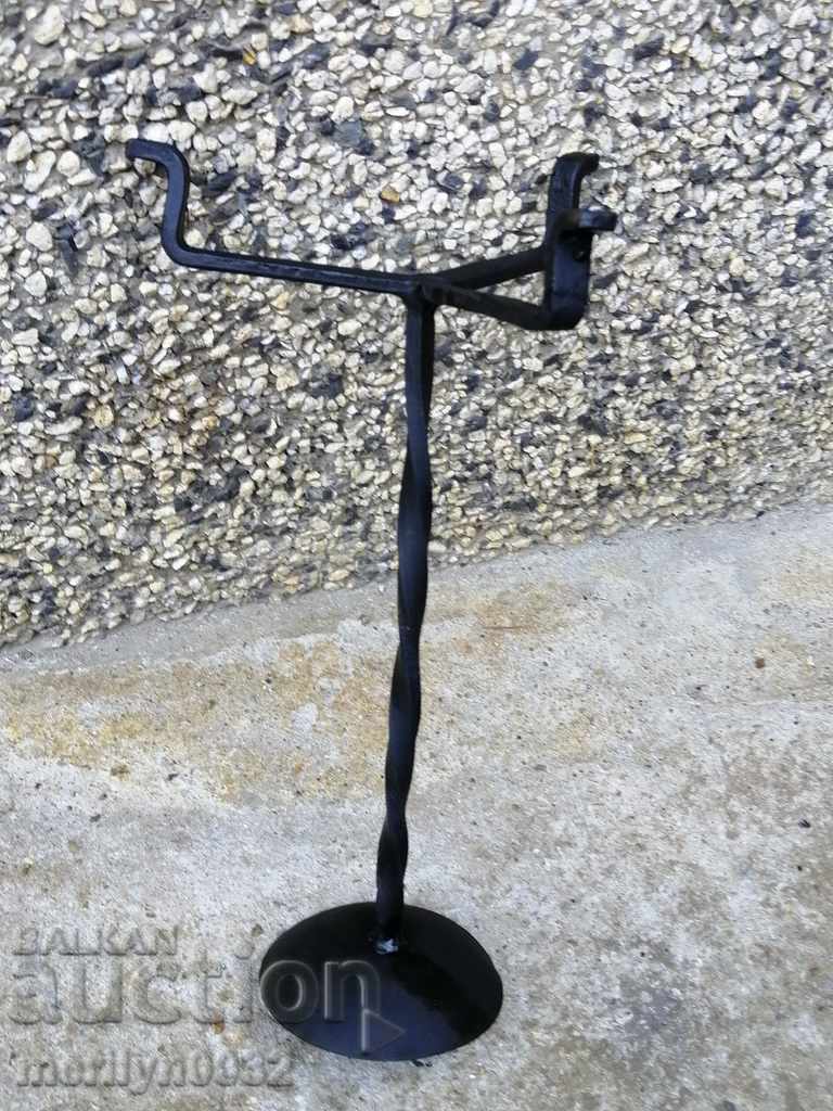 Delivery of An old candle made of wrought iron lamp
