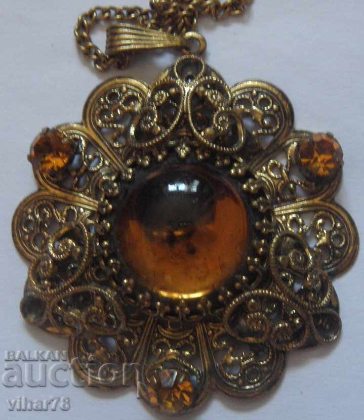 Auction medallion-brooch, ring set Auction medallion-brooch, ring set