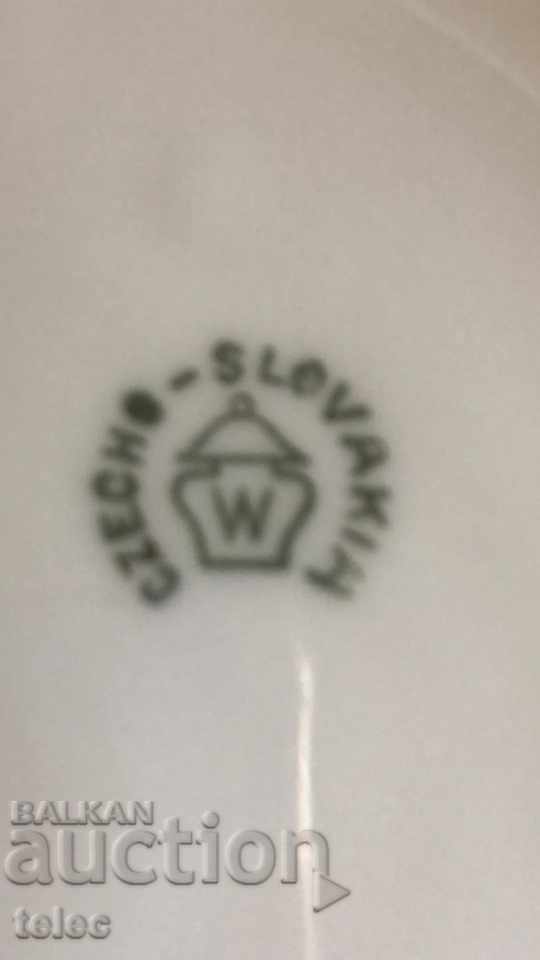 Delivery of Two plates of porcelain from the 1920s Delivery of Two plates of porcelain from the 1920s