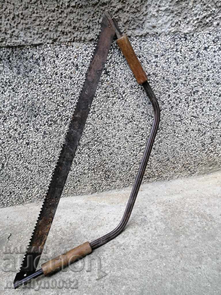 Old tool saw for wood bull bullfinch