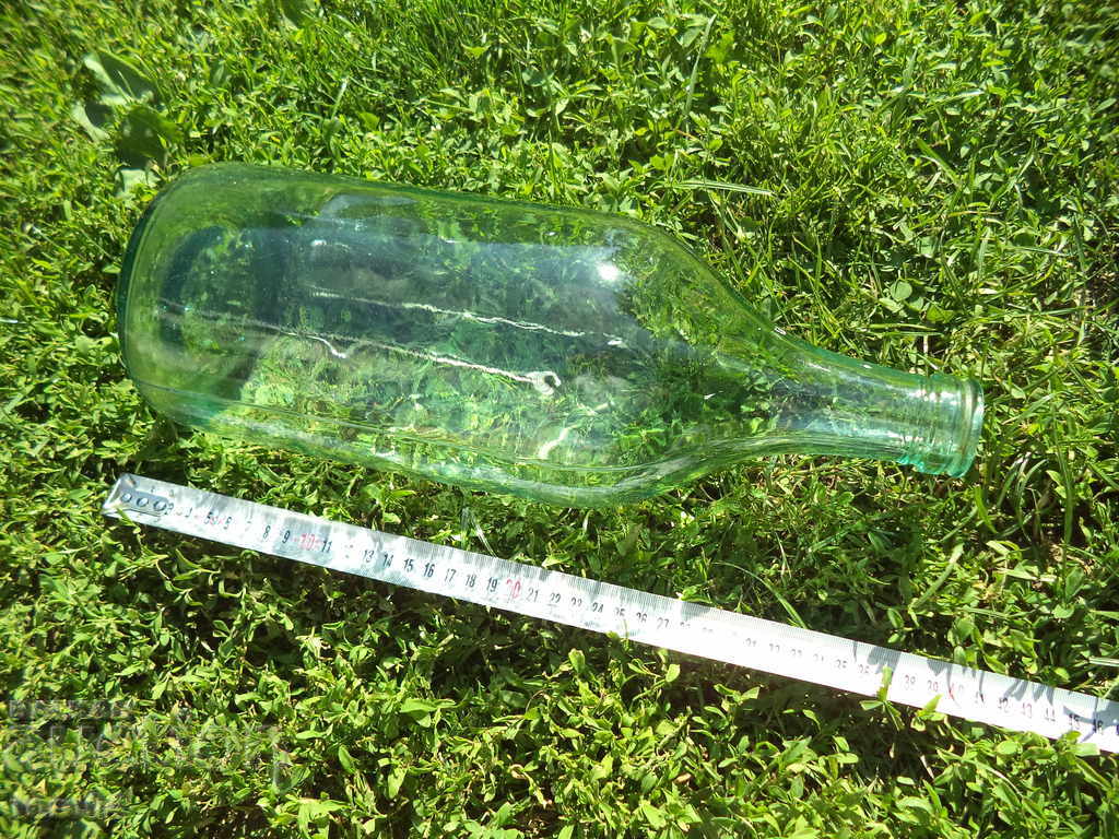 Auction LARGE OLD GLASS BOTTLE - DAMADJANA Auction LARGE OLD GLASS BOTTLE - DAMADJANA