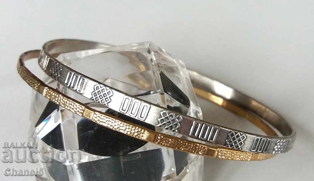 TWO OLD HARD BRACELETS - SILVER AND GOLD