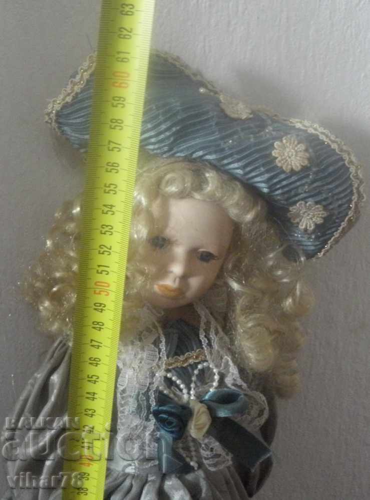 Delivery of Collectible porcelain doll Delivery of Collectible porcelain doll