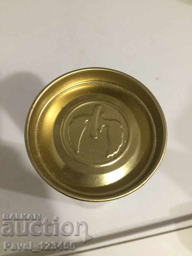 Delivery of old small cardboard box of ouzo