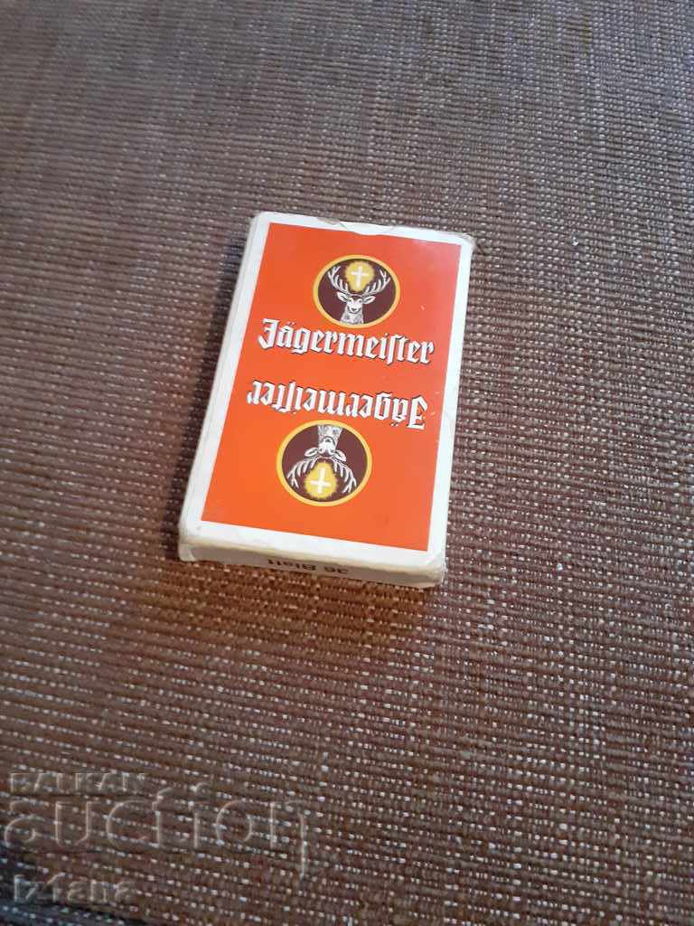 Old Jagermeifter playing cards
