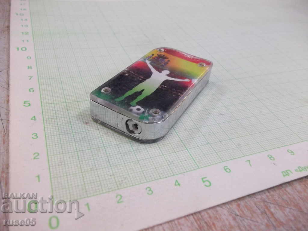 Auction Piezocrystalline gas lighter with soft flame working Auction Piezocrystalline gas lighter with soft flame working