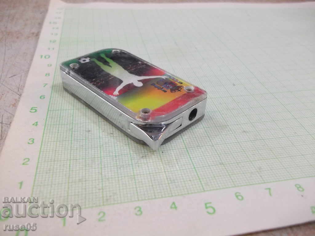 Piezocrystalline gas lighter with soft flame working - 5 Piezocrystalline gas lighter with soft flame working - 5