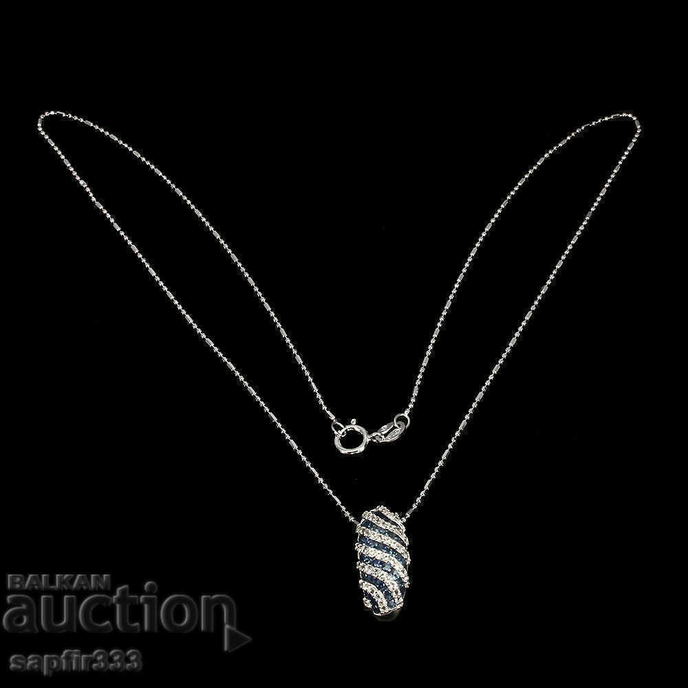 Auction DESIGNER MEDALLION WITH NATURAL SAPPHYRES AND TOPAS Auction DESIGNER MEDALLION WITH NATURAL SAPPHYRES AND TOPAS