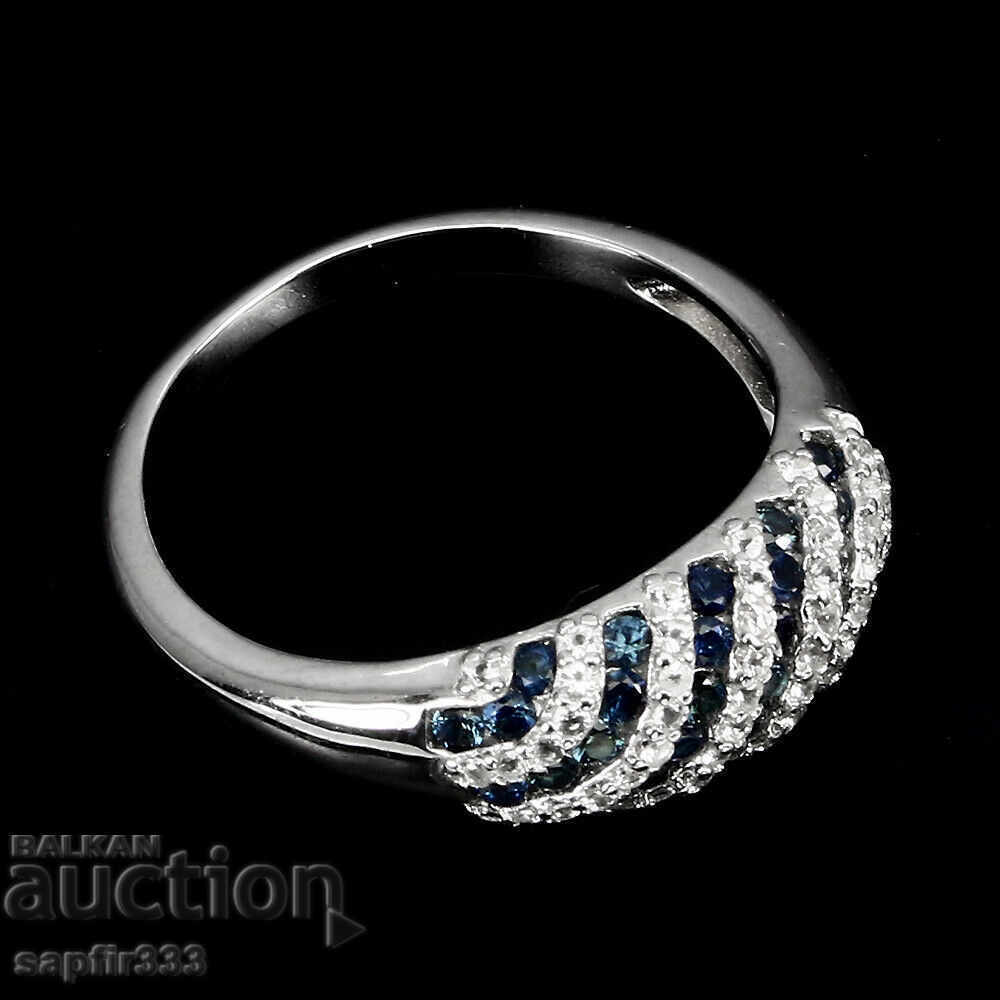 Auction  DESIGNER RING WITH NATURAL SAPPHYRES AND TOPAS