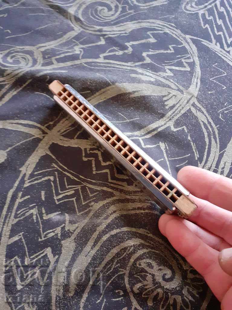Auction  Old harmonica