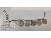 Silver bracelet with coins