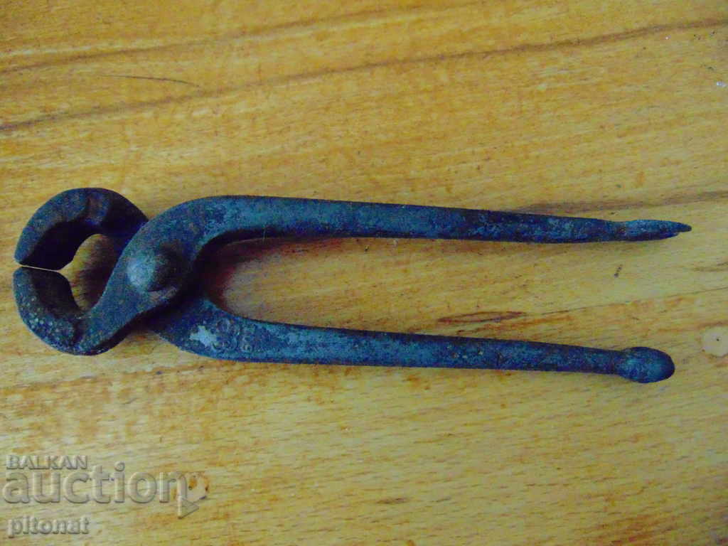 Antique tool curved pliers