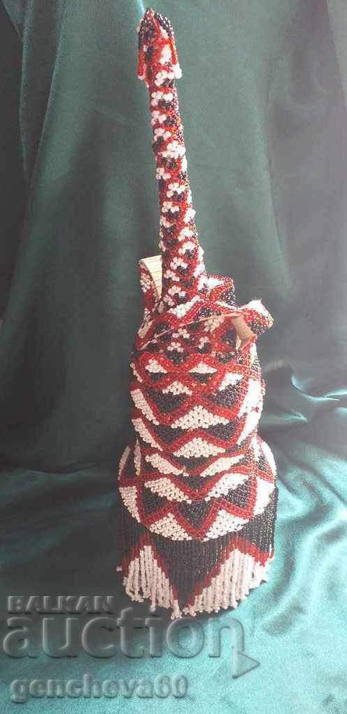 Auction  RARE Galama ART Beaded bottle