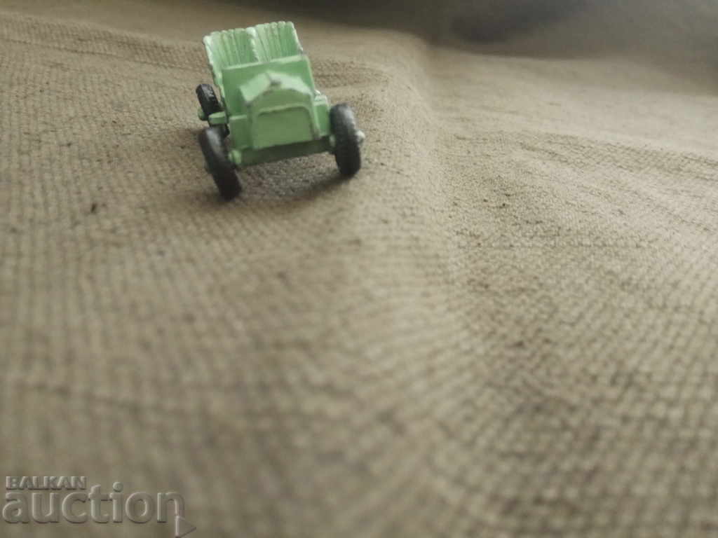 Auction  Small green metal stroller Opel 1909