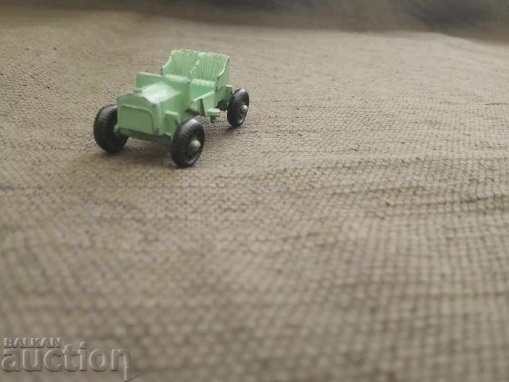 Μικρό πράσινο μεταλλικό καρότσι Opel 1909