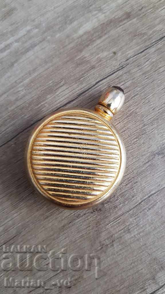 An old perfume bottle with price 15.00 BGN | € 7.67