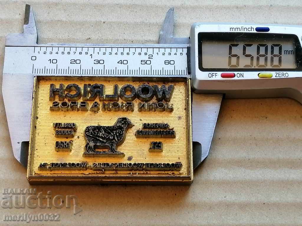 Auction  Bronze stamp English word order