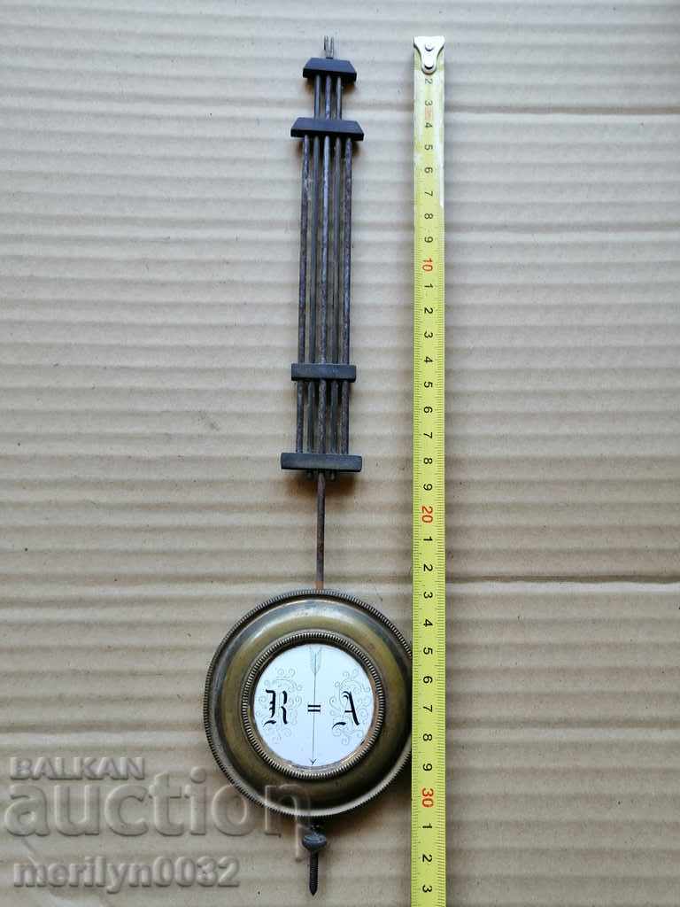 Auction Pendulum from an old wall clock Auction Pendulum from an old wall clock
