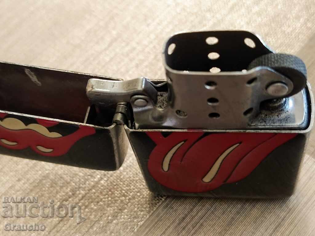 Auction  Rolling Stones petrol lighter