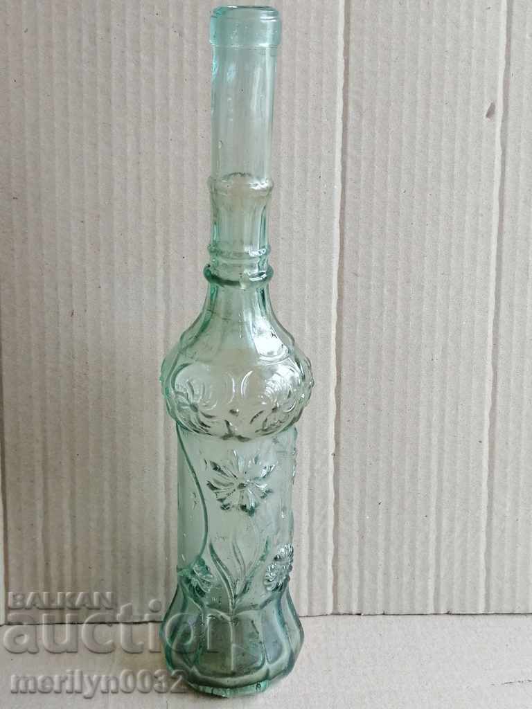 An old bottle of glass, a REDKAW bottle