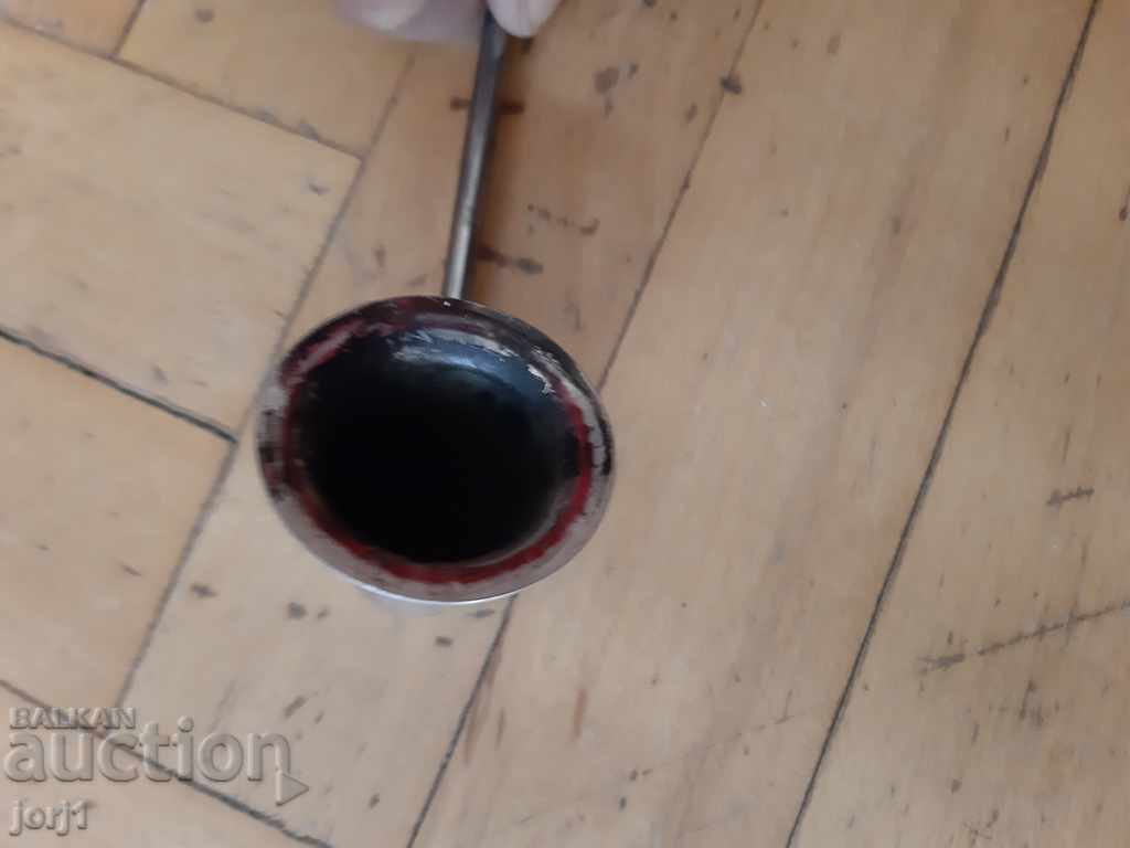 Auction  silver-plated candle extinguisher