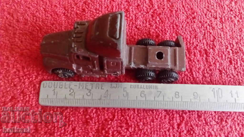 Old toy model Truck Tire metal plastic