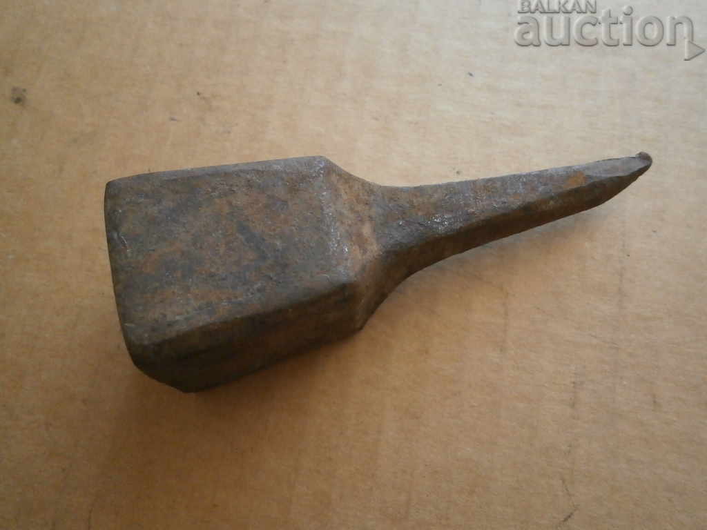 Auction  an ancient primitive anvil