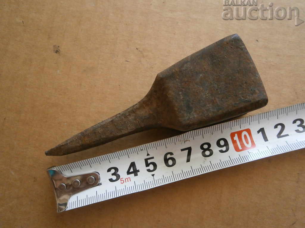 an ancient primitive anvil - 7