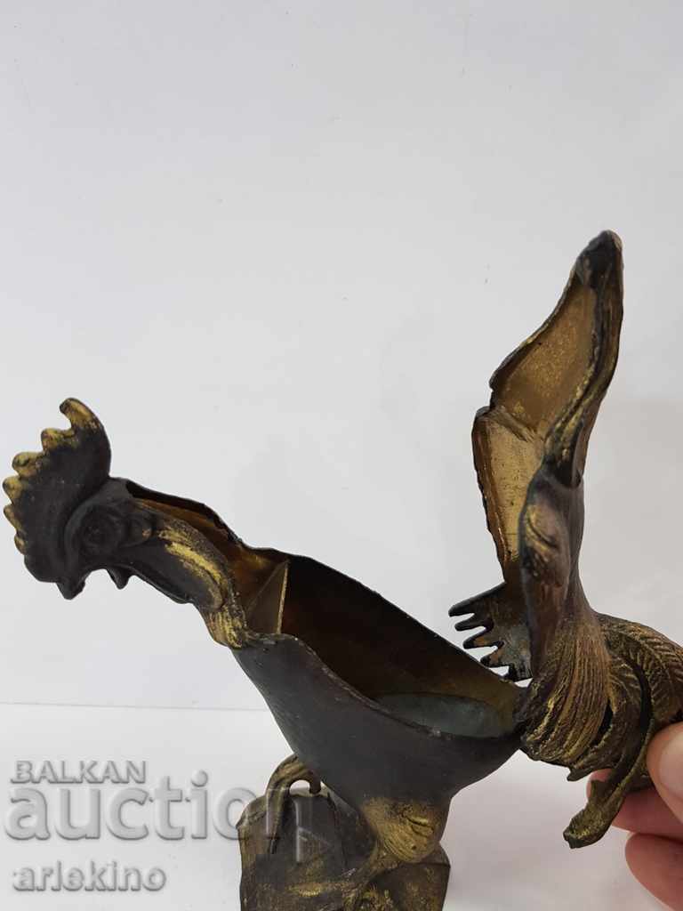 Delivery of Collectible metal statuette of a rooster that opens Delivery of Collectible metal statuette of a rooster that opens