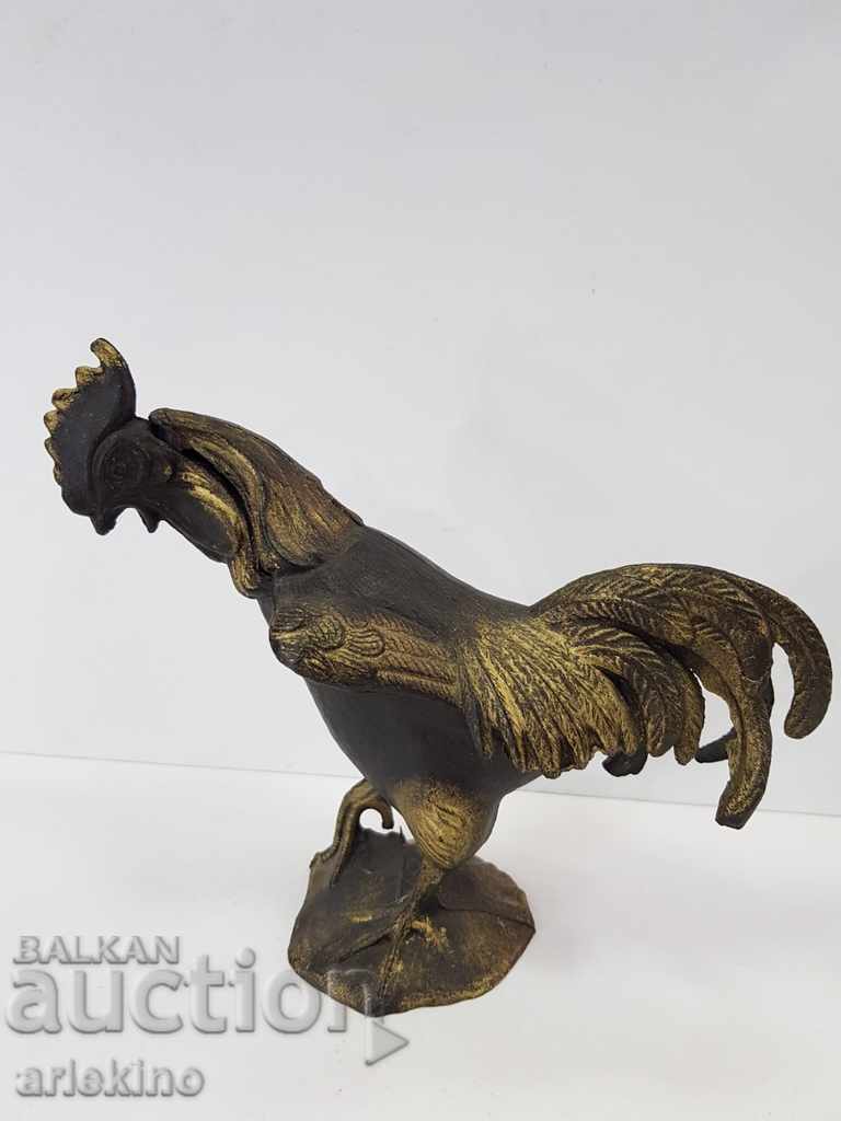 Collectible metal statuette of a rooster that opens