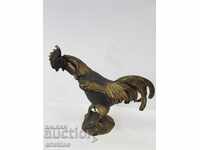 Collectible metal statuette of a rooster that opens