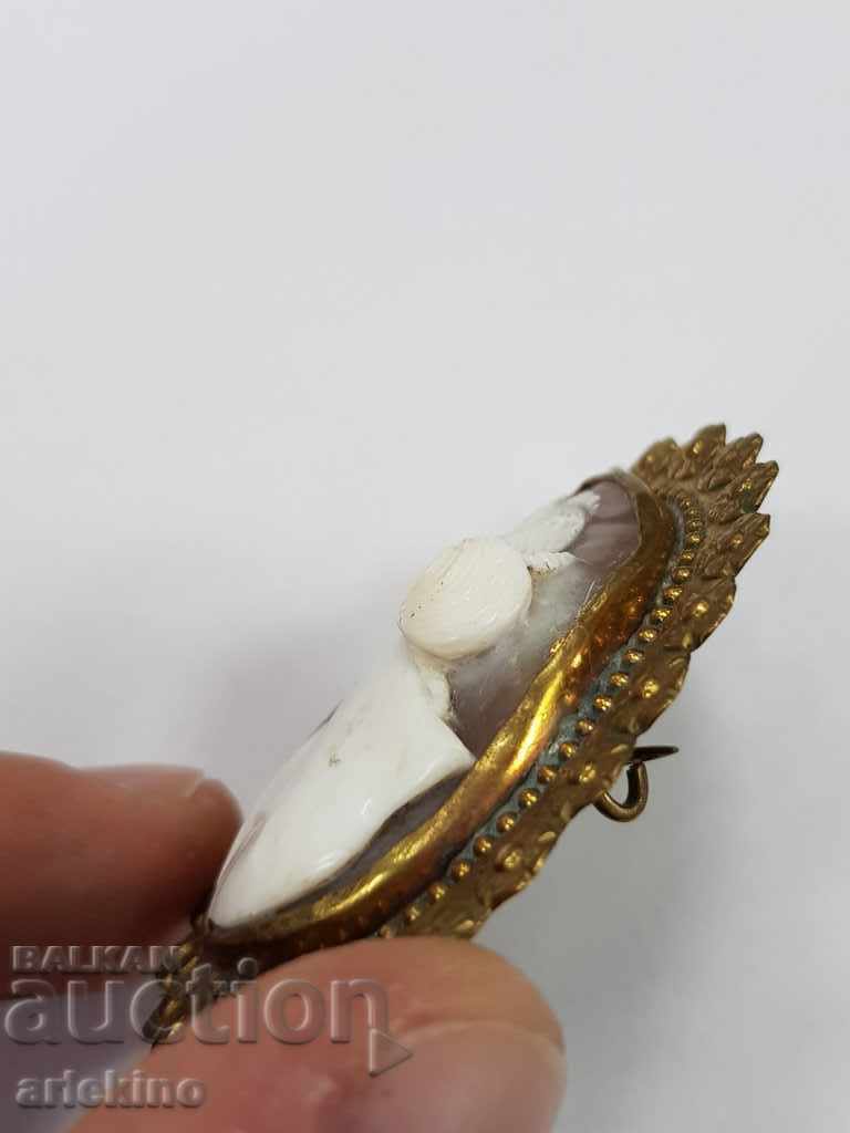 Auction Collectible old brooch with a huge cameo 19-20 century Auction Collectible old brooch with a huge cameo 19-20 century
