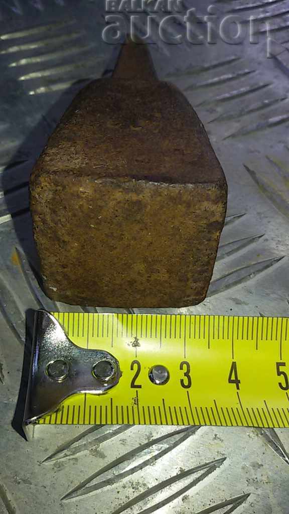 an ancient primitive anvil - 5