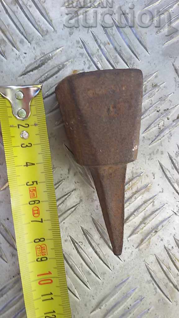 an ancient primitive anvil - 6